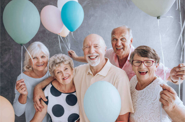 Elders all smiles after dental implants cost full mouth restoration.